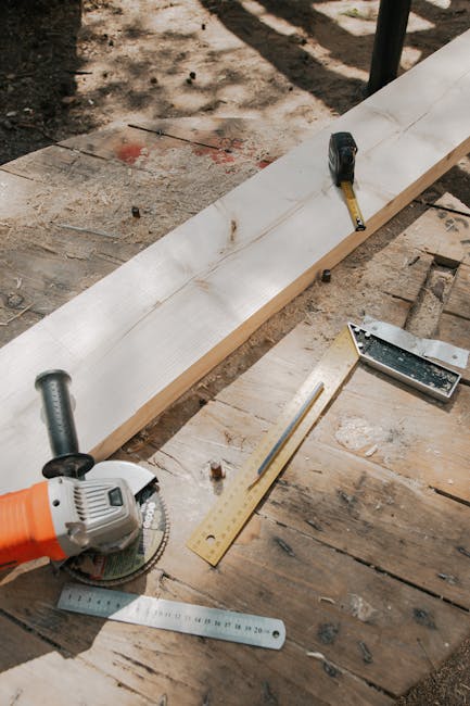 A collection of carpentry tools on a wooden workbench, ideal for crafts and DIY projects.